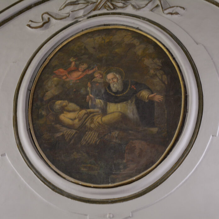 Tondo pittorico raffigurante probabilmente Sant’Antonio Abate, riconoscibile dal saio scuro e dal bastone a tau, mentre assiste San Paolo Eremita morente, immagine simbolica del culto del fuoco e del cippo di Sant’Antuono a Napoli